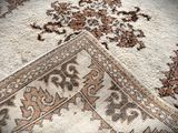 an image of a close up of a rug on a floor