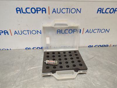 a plastic case with a small amount of batteries inside of it
