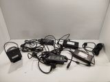 a lot of power cords that are on the table