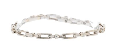 a close up of a bracelet on a white background