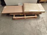 a pile of boxes sitting on a pallet in a warehouse