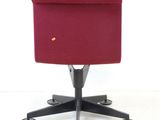 an image of a red chair with wheels on a white background