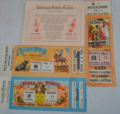 several tickets for a rodeo show are on a table