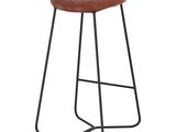 un tabouret en cuir marron avec des pieds noirs et une structure métallique