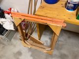 a wooden table with a piece of wood on top of it