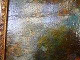 une image d'un tableau sur le mur d'une pièce