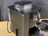 a coffee maker that is sitting on a table