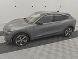 2020 ford mustang macht in a clean garage with a checkered floor