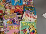 a lot of comic books sitting on a table