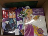 many books in the box on the table