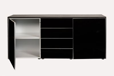 Meuble de rangement en stratifié faux bois laqué noir.