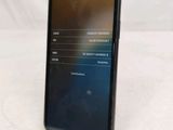 the back of a black phone with a display on the screen