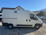 a white van parked in a parking lot