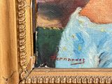 portrait of a woman in a blue dress in a gold frame