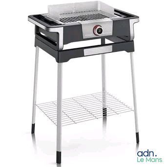 a black and white grill with a grill top on a stand
