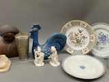 many different types of decorative items displayed on the table
