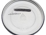 a close up of a metal container with a label on it