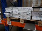 many boxes that are stacked on a shelf in a warehouse