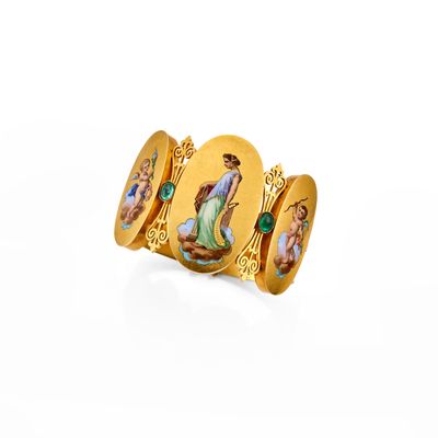 an image of a gold ring with a picture of a woman and a man