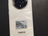 a close up of a cell phone on a table with a sticker on it