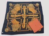 blue and gold silk scarf with a picture of a pair of shoes and a red box