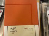 many folders on the table with a lot of them