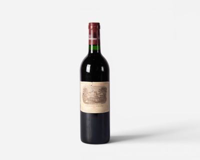 a bottle of wine that is sitting on a table