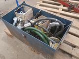 a box with a bunch of hoses in it on a pallet