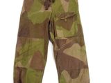 a close up of a camouflage pants on a white background