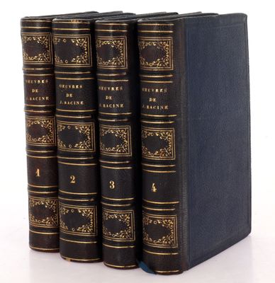 a set of four books sitting on top of each other