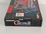 a close up of a nintendo game box on a white surface