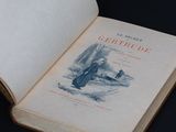 an open book with a picture of a man on it