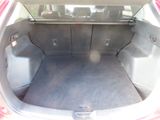 a trunk of a car with the back seats folded down