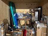 a small room with a lot of boxes on the floor