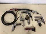 an assortment of tools are laid out on a table