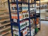a store with shelves full of different types of cleaning products