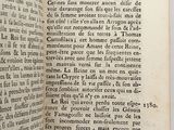 a book open to a page with a picture of a horse