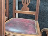 two chairs that are next to each other on the floor