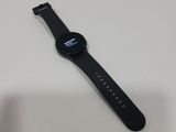 a close up of a smart watch sitting on a table
