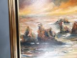 a picture of a painting of a sunset over the ocean