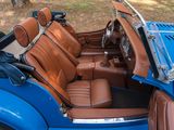 an image of a blue and brown car with leather seats