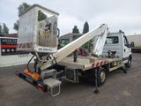 a white truck with a crane on the back of it