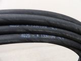 a close up of a black hose on a table