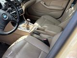 beige interior of a car with leather seats and steering wheel