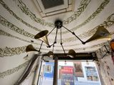 a chandelier that is hanging from the ceiling in a room
