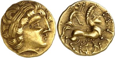 a gold coin with an image of a woman and a horse