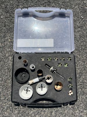 a tool kit in a plastic case on the ground