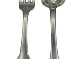 two silver spoons and a fork on a white background