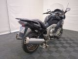 a motorcycle that is parked in a garage