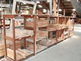 a large room filled with lots of wooden items